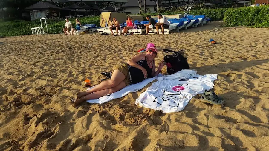 Joyce lounging at the beach.
