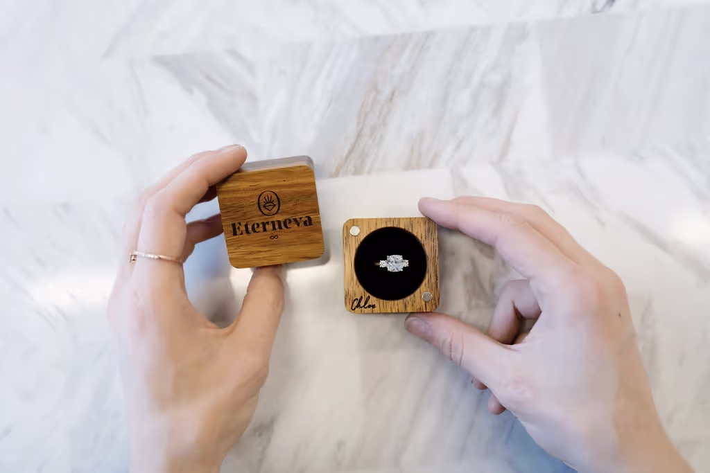 Diamond ring in an Eterneva engraved wooden box.